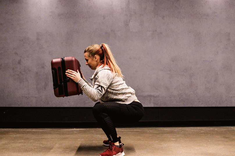 The Suitcase Workout to Keep You on Track While Traveling Muscle